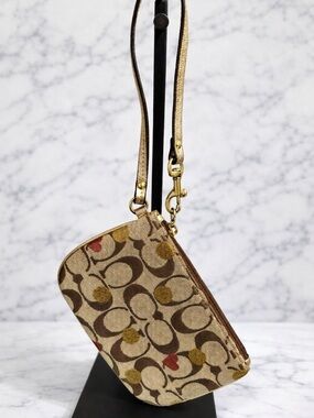 Coach Poppy Signature Lurex Heart Small Wristlet.